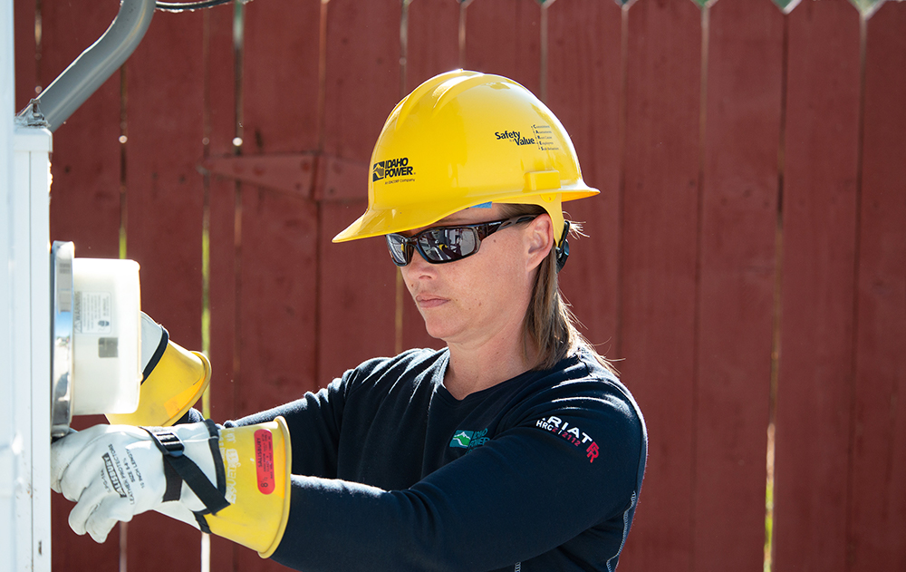 Photo of a woman with a hard hat