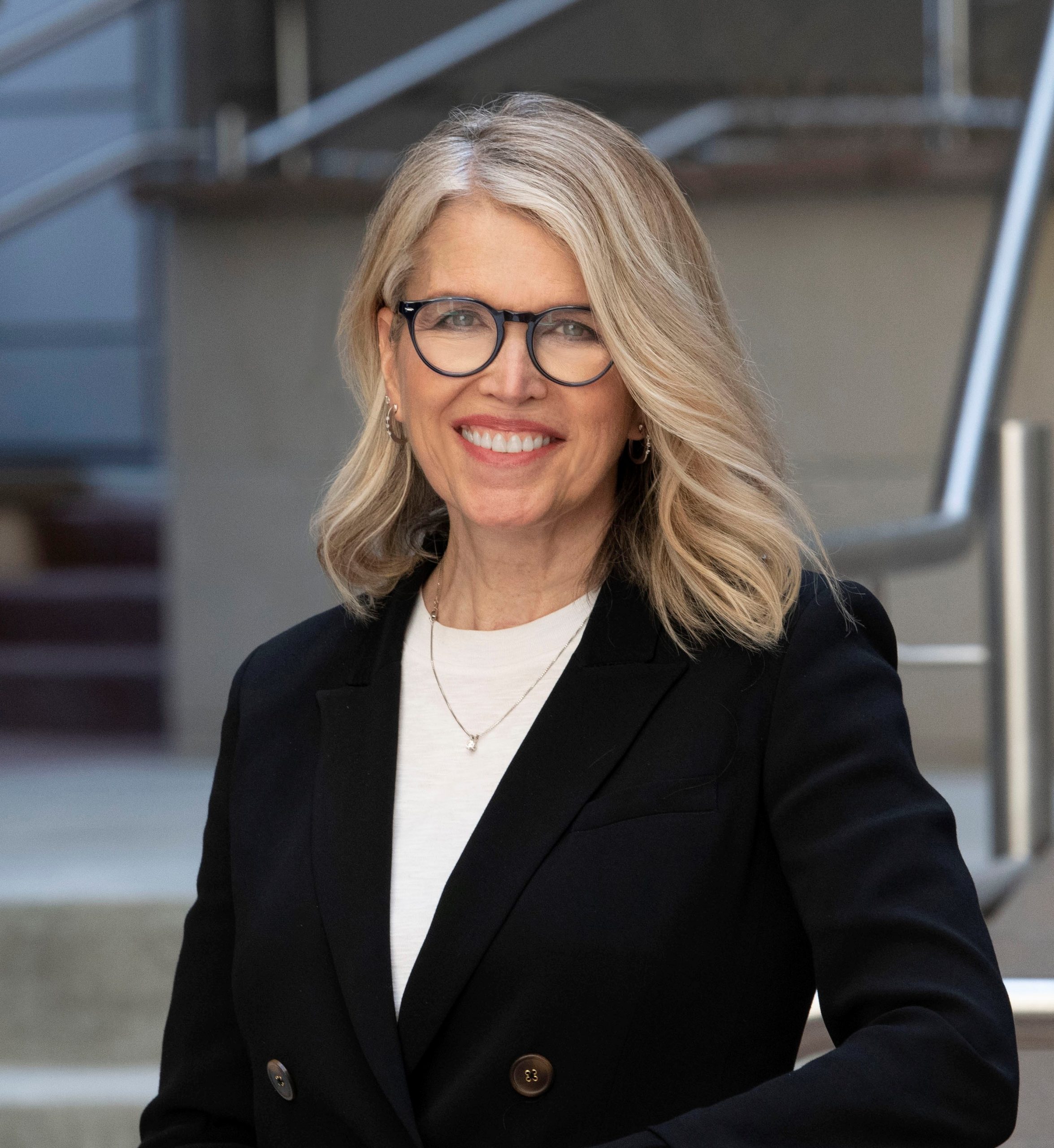 Outdoor headshot of CEO Lisa Grow