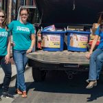 A group of Idaho Power employees gathered books for the book drive