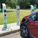 A car being charged at an EV charging station