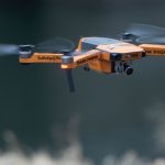 A drone flying over a field