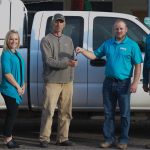 Keys to a donated truck are handed off to the city of Carey's Public Works Director, Steven Grigsby.