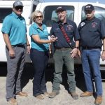 Murphy Reynolds Wilson District officials take truck donation from Idaho Power.