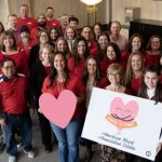 Idaho Power employees gather for Wear Red Day to raise awareness of cardiovascular disease affecting women.