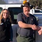 Idaho Power employees deliver a donated pickup to the city of Halfway, Oregon