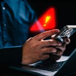 Permalink to Beware of Door-to-Door and Phone Scams Targeting Idaho Power Customers Person with a computer and phone and a warning sign near the phone