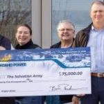 Permalink to Donor Support Gives Project Share a Boost to Help with Energy Bills Six people standing in a row, looking at the camera and two of them are holding a large check made out to the Salvation Army from Idaho Power.