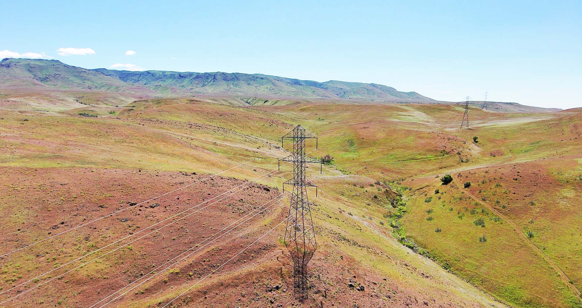 Transmission line running through foothills