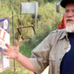 Permalink to Idaho Power Donation Helps Placerville Build New Pump Station A man gesturing in front of a red fire truck, next to a sign that says Placerville fire protection.